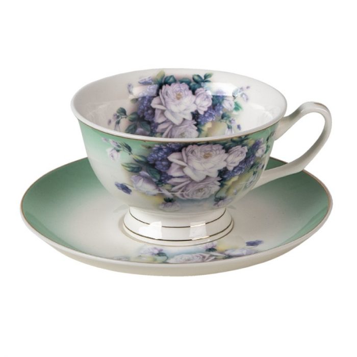 Tasse et soucoupe en porcelaine florale