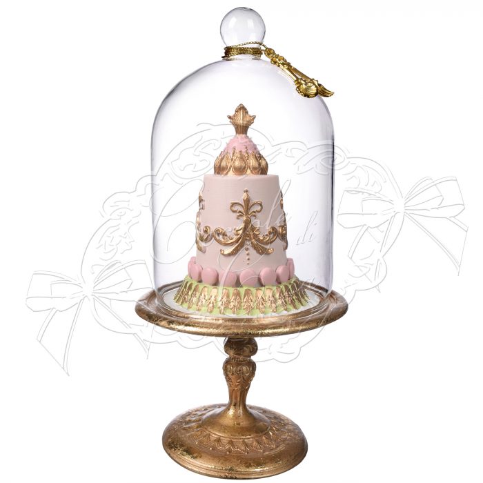 Gâteau rose sous cloche