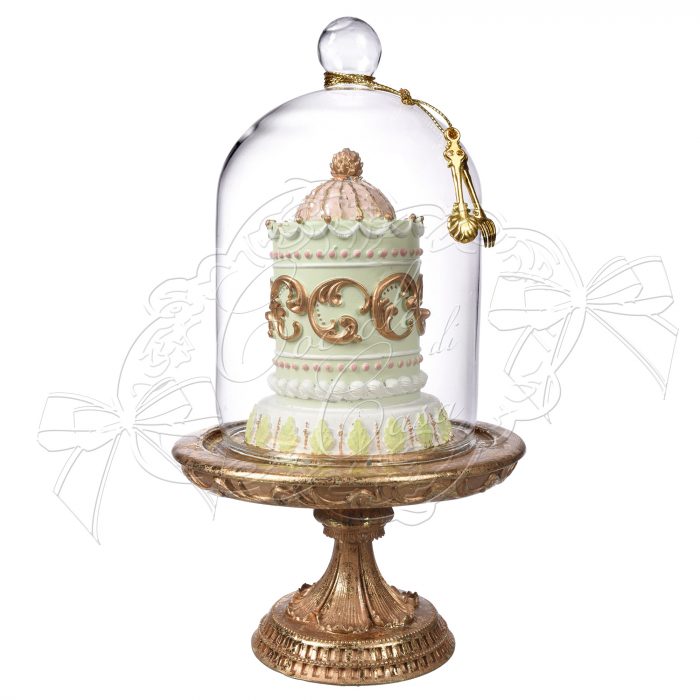 Gâteau vert en résine sous cloche