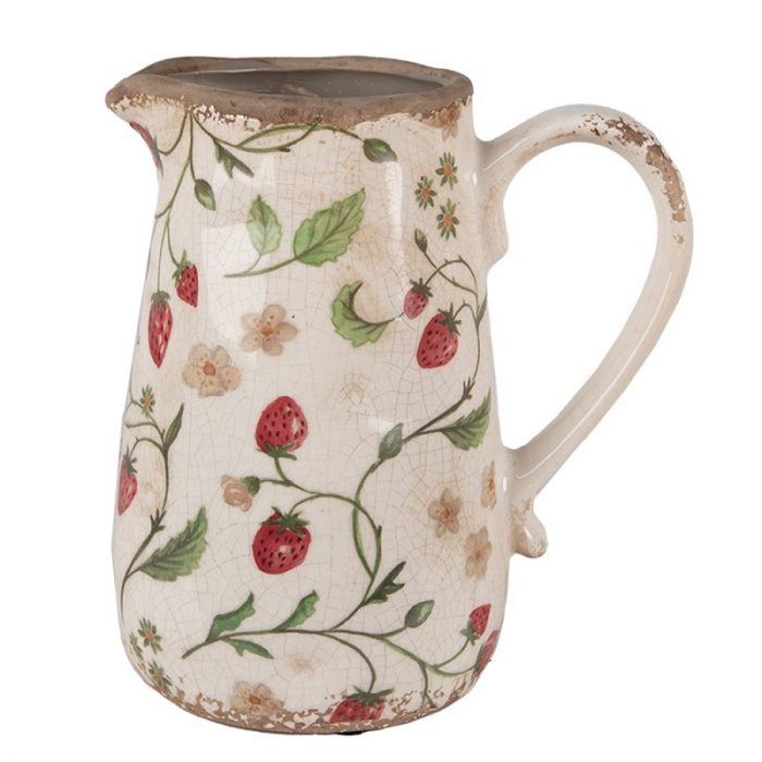 Pichet décoratif avec des fraises